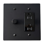 Black wall switch and socket on a white background
