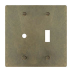 2-gang solid brass dimmer and toggle wall plate in aged bronze hand-brushed finish, rotary plus toggle opening