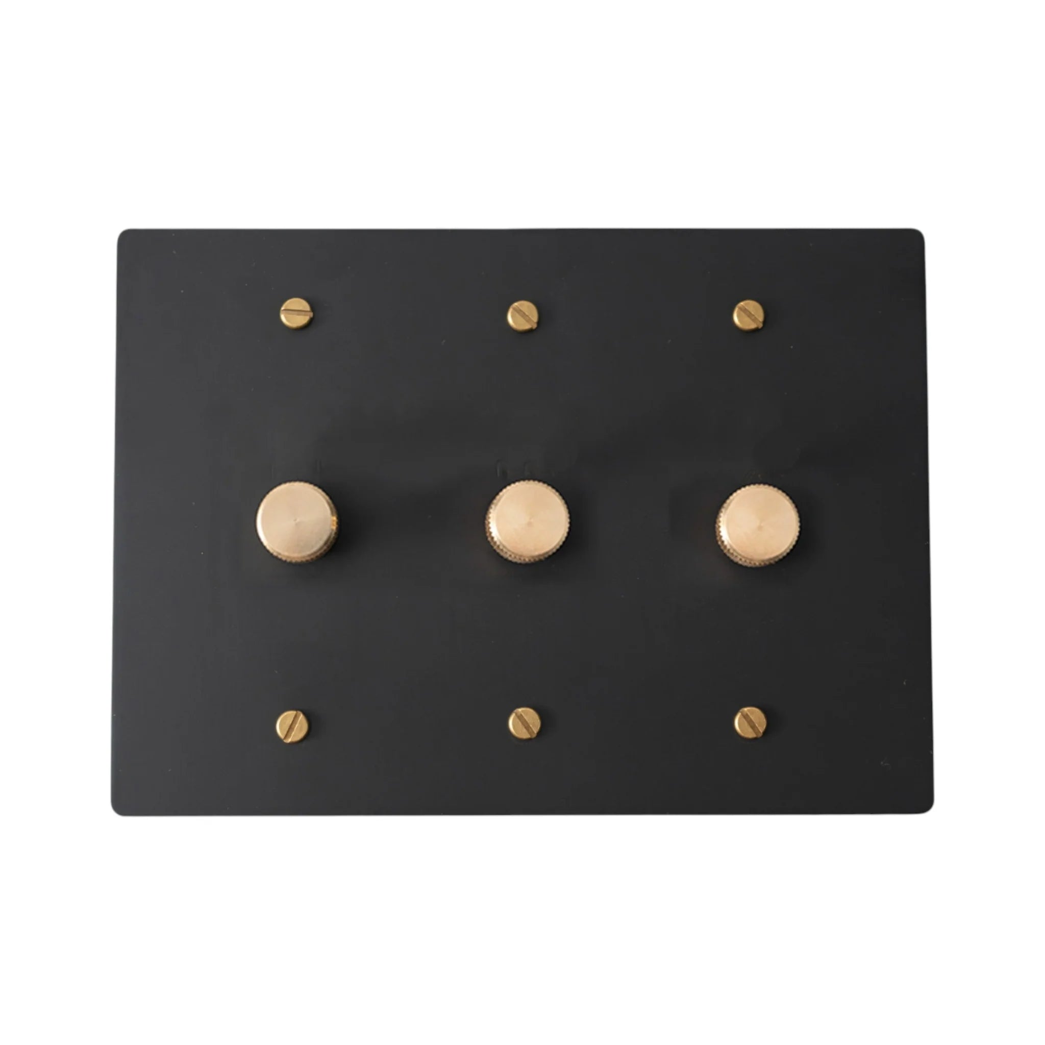 Black 3 gang dimmer wall plate with gold screws on a white background