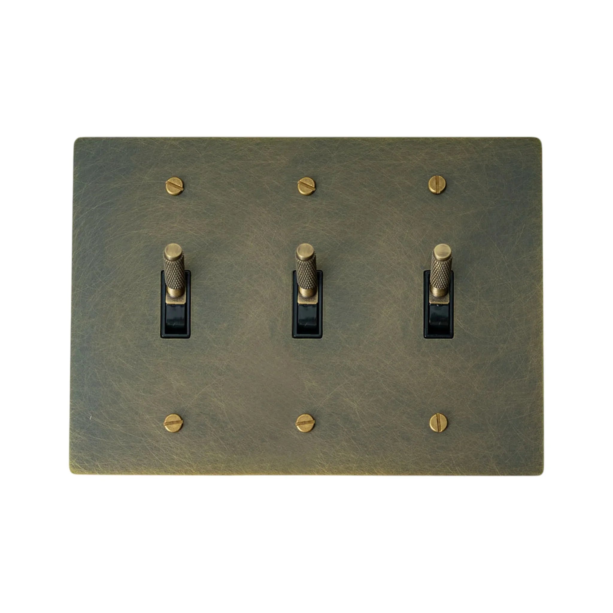 Bronze three-toggle switch plate with brass screws on a white background