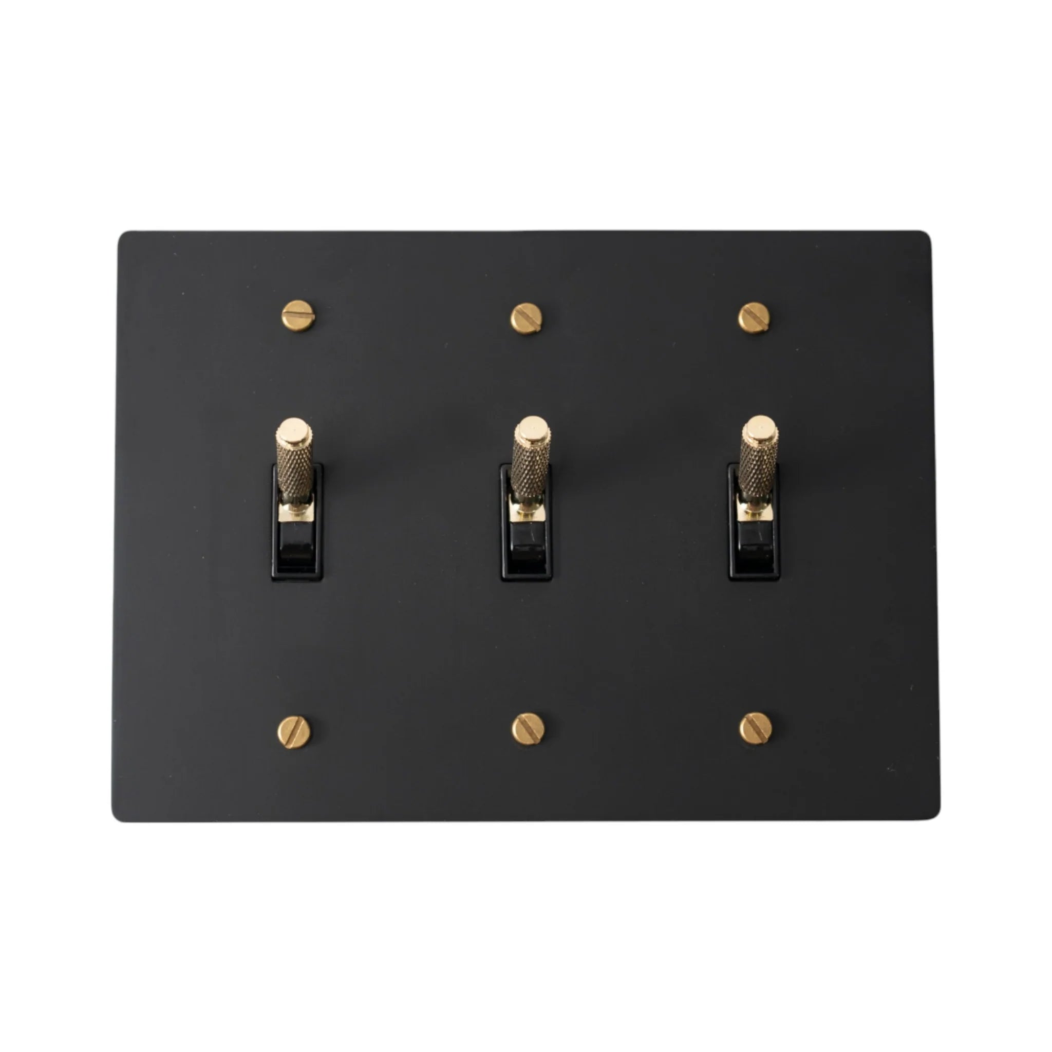 Close-up of knurled toggles on matte black 3-gang switch plate
