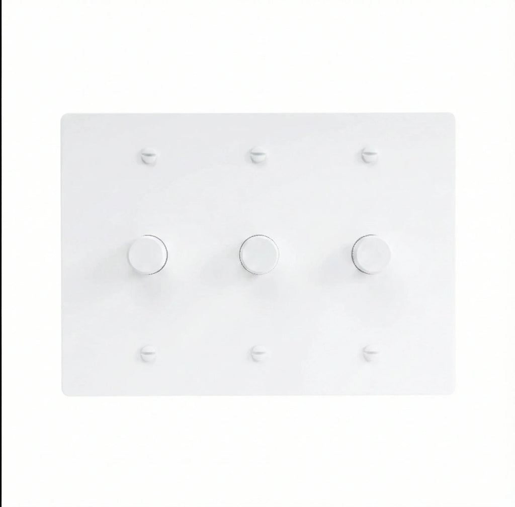 White light switch panel with multiple switches on a white background