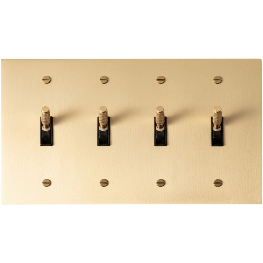 4-gang knurled toggle light switch plate in satin brass, front view