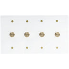 Four gang white dimmer switch panel with brass rotary knobs on minimalist glossy white plate.