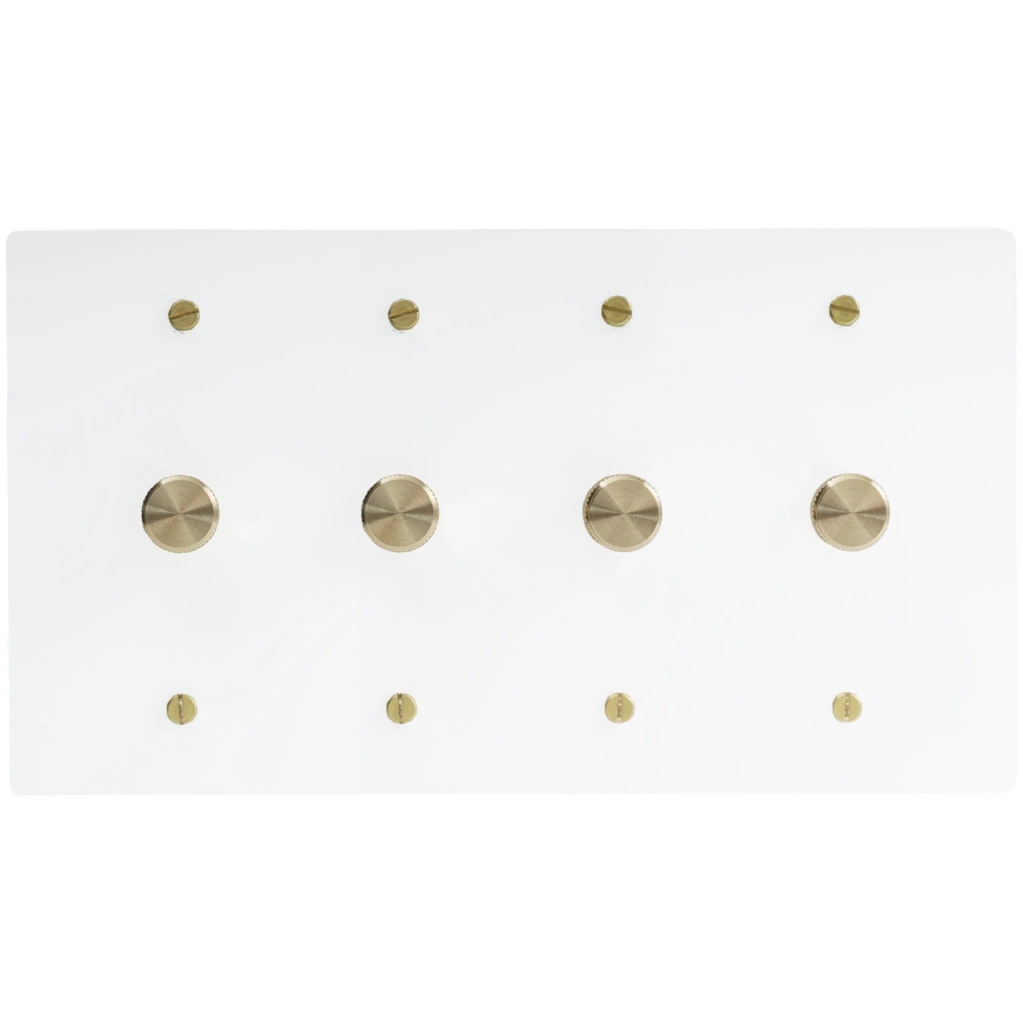 Four gang white dimmer switch panel with brass rotary knobs on minimalist glossy white plate.