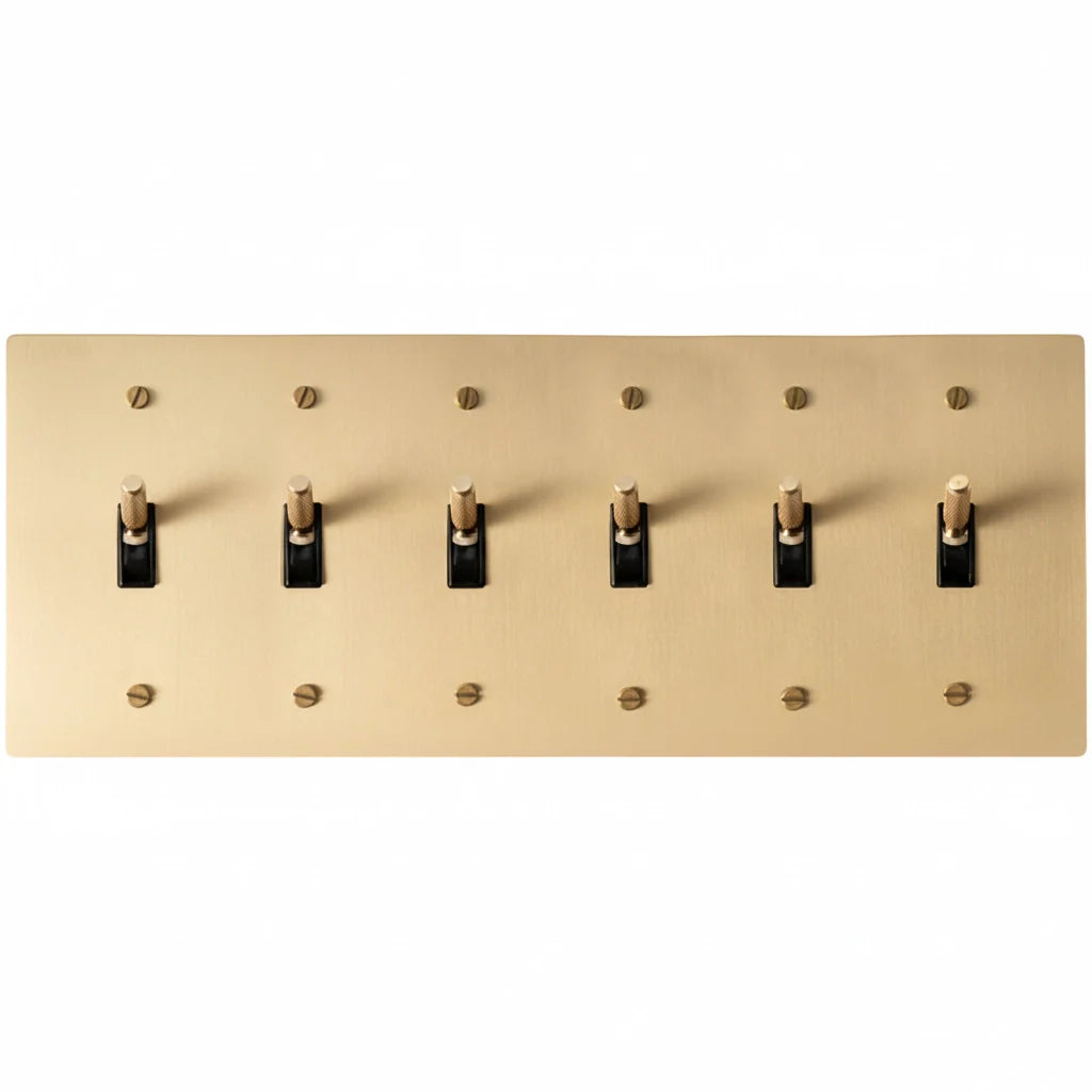 6-gang knurled toggle light switch plate in satin brass, front view