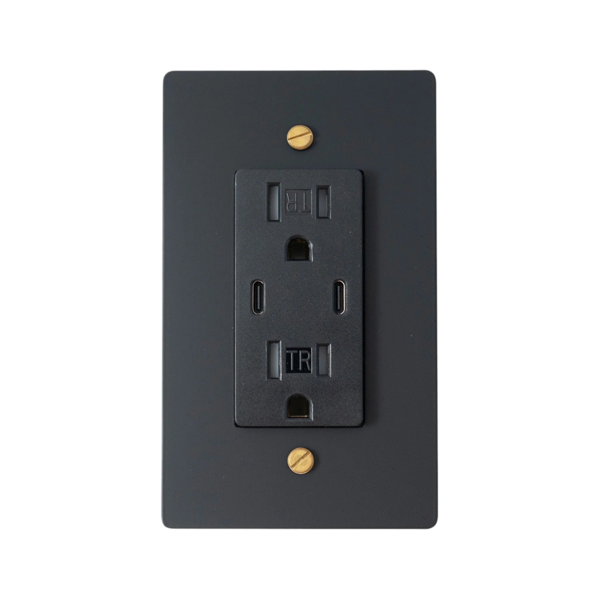 Black electrical outlet with gold screws on a white background